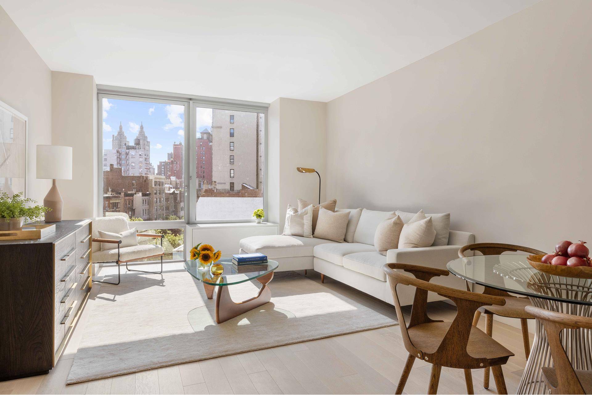 This gracious 1, 694 square foot, three bedroom, two and a half bath residence features 10 foot ceilings and opens onto five inch white oak plank floors.