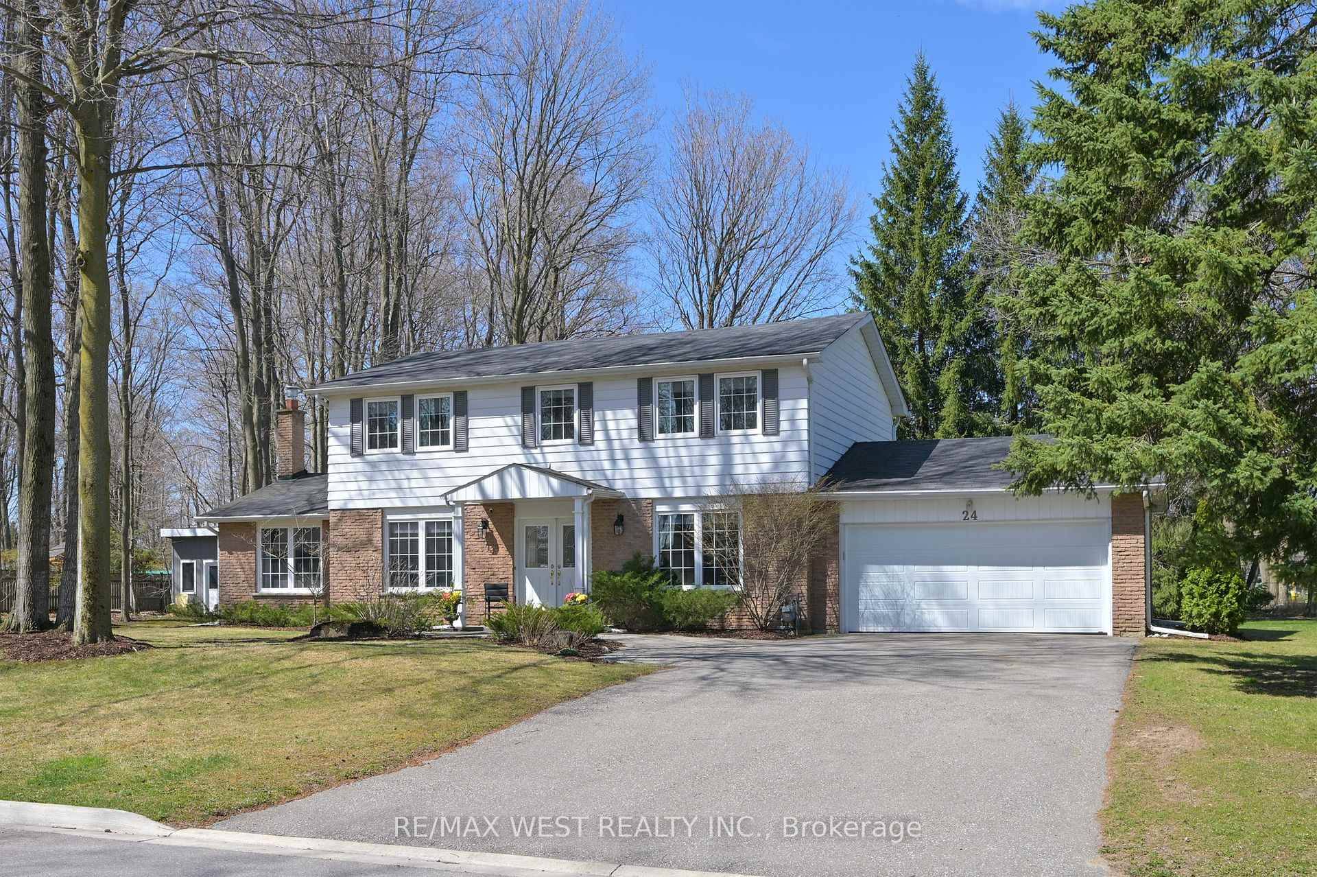 This beautifully updated home is located on a quiet, sidewalk free, cul de sac, surrounded by mature trees that offer a park like setting and timeless charm.