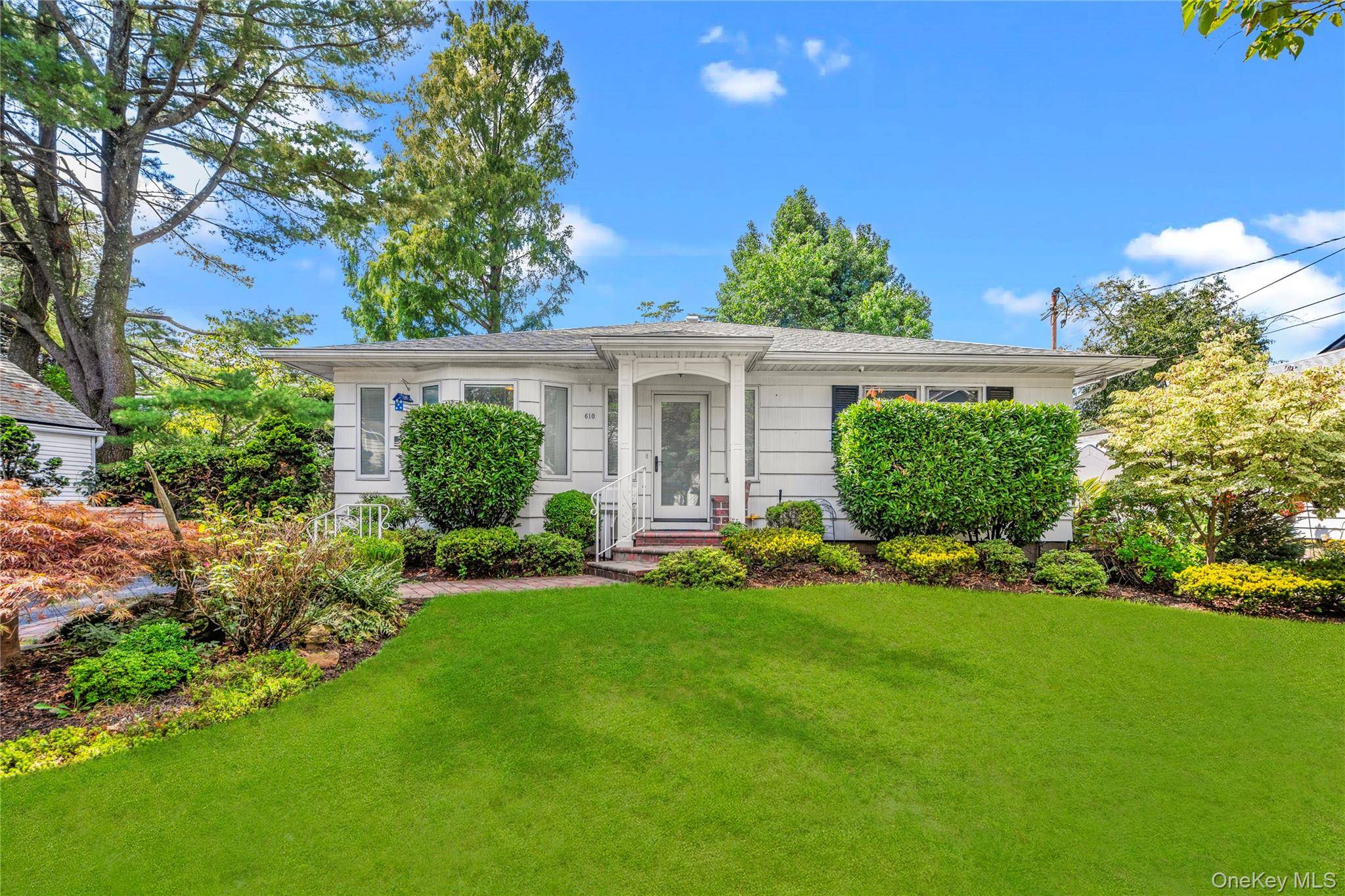 Charming expanded ranch in the heart of West Hempstead.