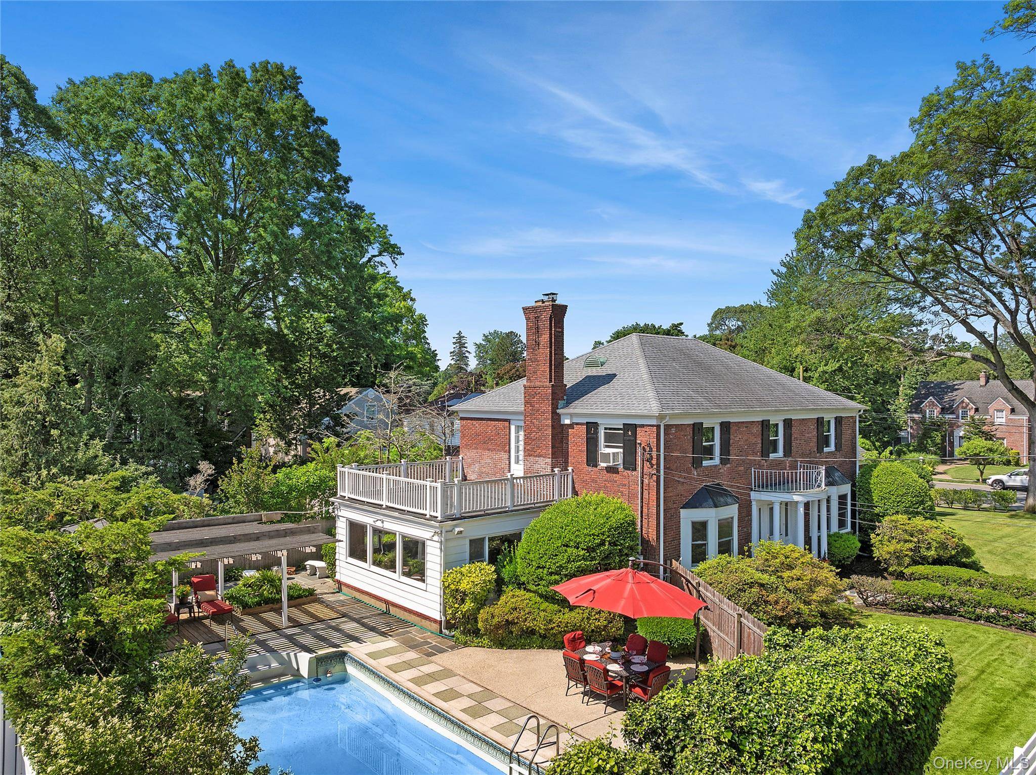 Nestled in the prestigious Stearns Park section of Freeport, within the Baldwin School District, discover this stately Center Hall Brick Colonial.