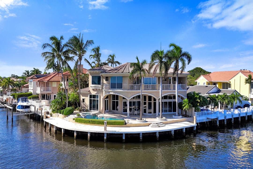 Welcome to prestigious Villa Bellavista and experience unparalleled luxury and privacy in this rare Intracoastal point lot estate, ideally situated within one of Delray Beach's most exclusive gated enclaves.