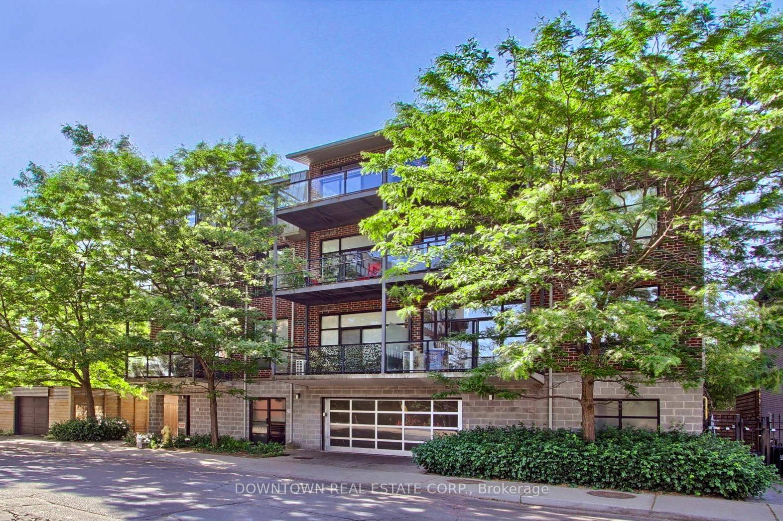 Designer top floor loft in sought after boutique building.
