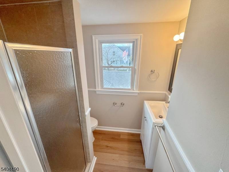 Welcome to 11 Van Dam Ave, a classic Cape Cod home set on a desirable corner lot in the heart of Bloomingdale.