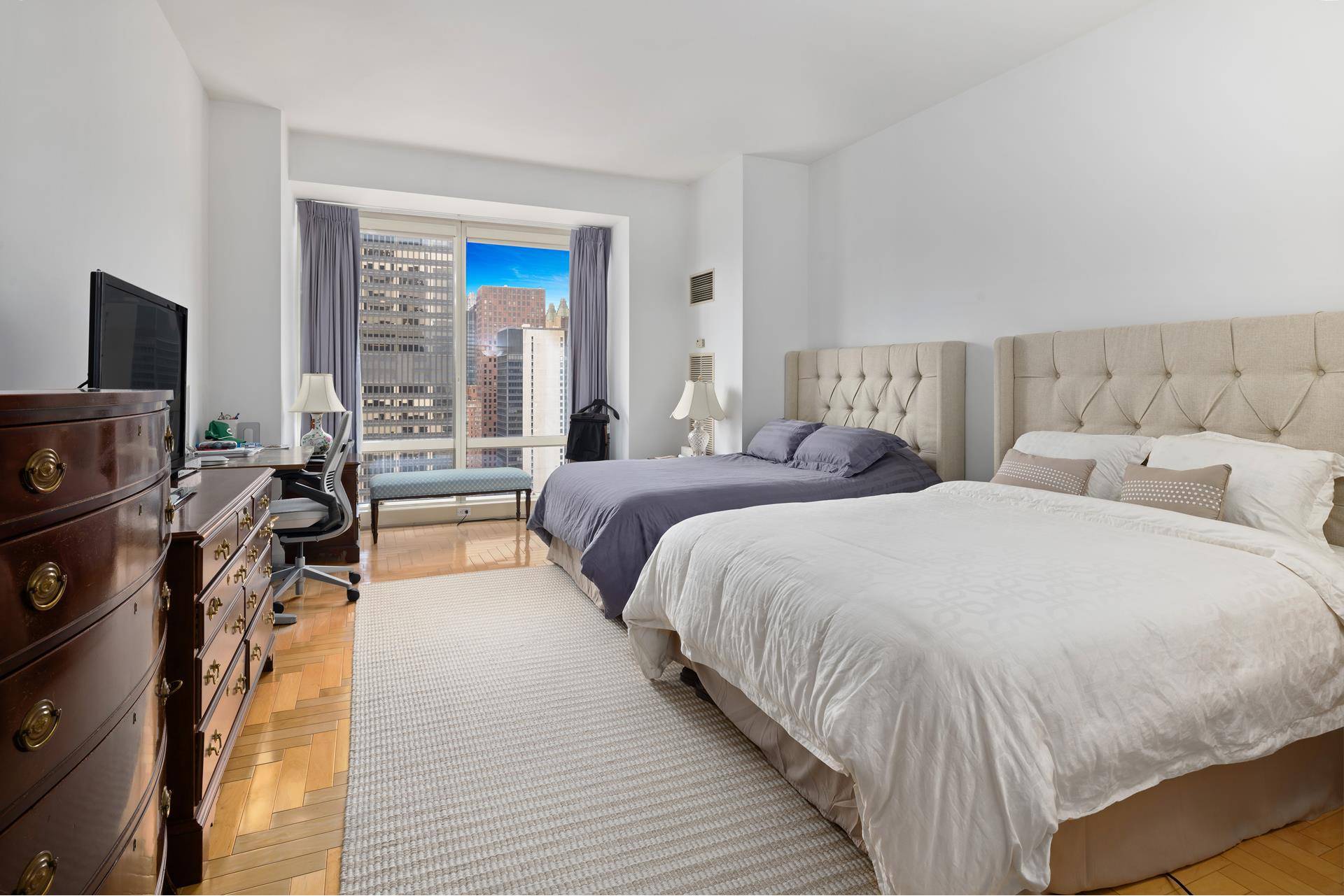 Exceptional 43rd Floor 2 bedroom, 3 full bathroom corner residence in the Sky.