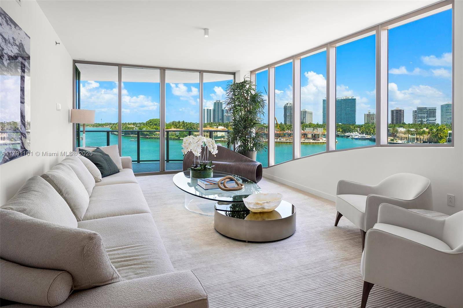 Step into this stunning corner unit at Onda, Bay Harbor s premier luxury building by Arquitectonica.