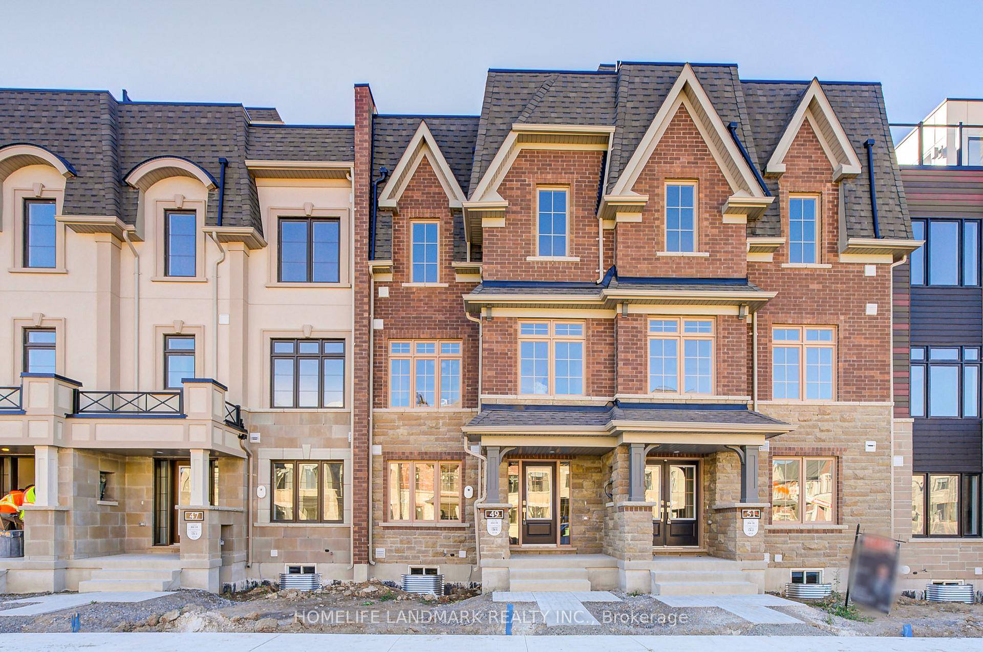 Welcome to this Brand new freehold rear lane townhouse with double car garage located in the prestigious Angus Glen neighborhood of Markham.