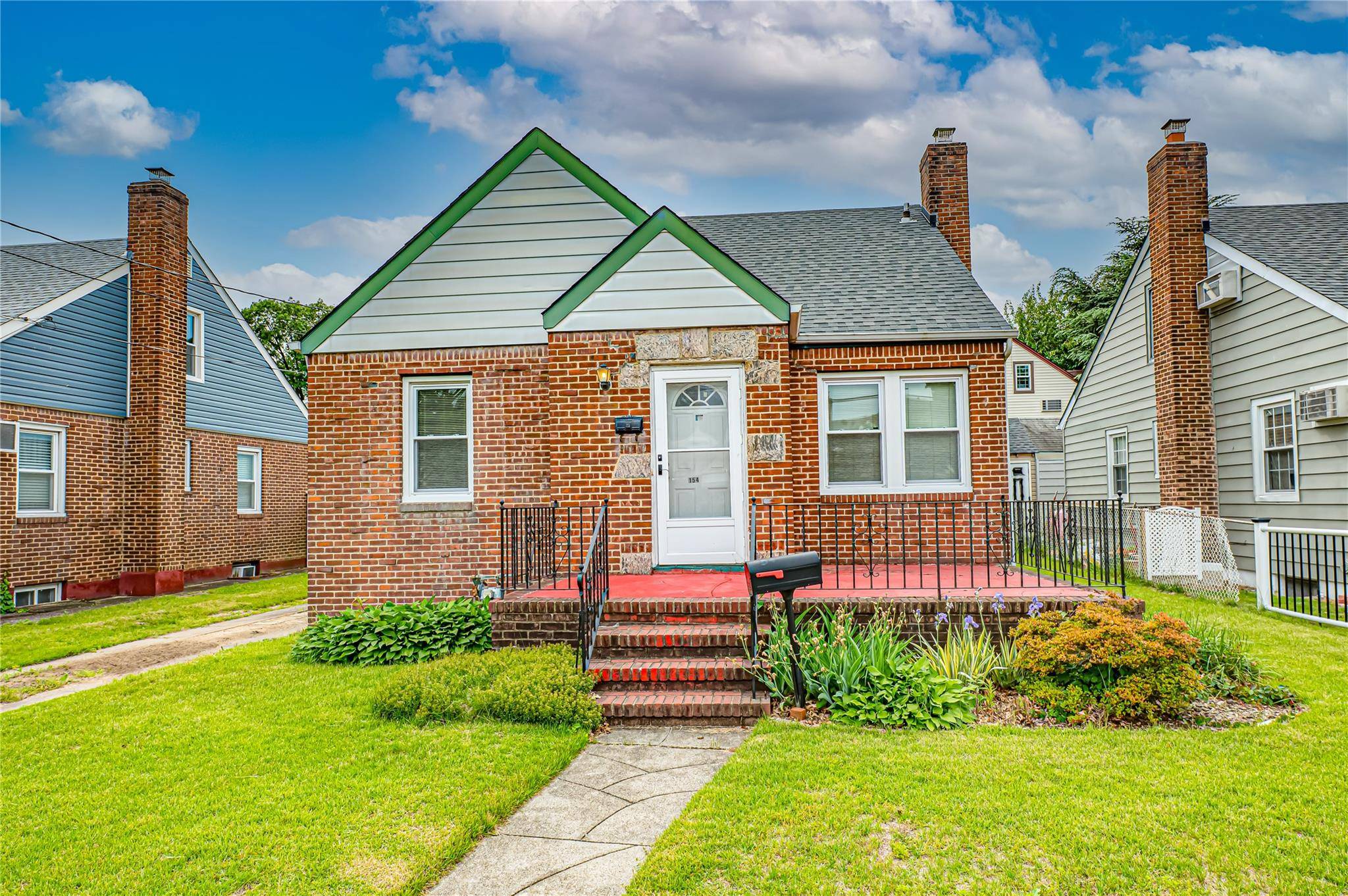 Come view this charming 1940's Cape Cod brick home with a front terrace.