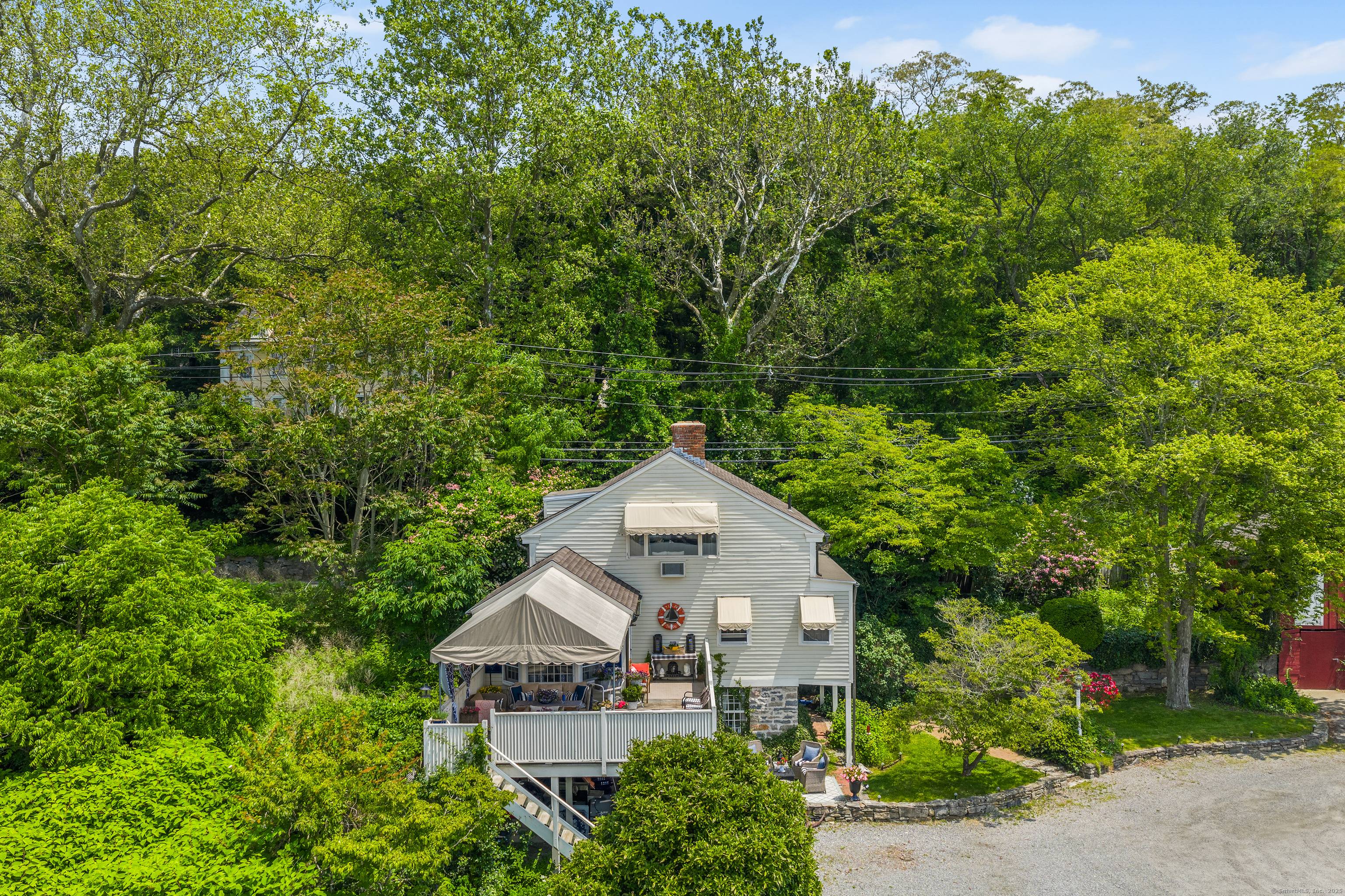 This single family residence is included in the sale of the adjacent Old Lyme Marina.