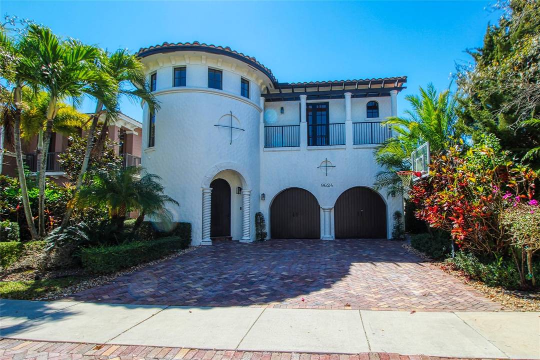 This great pool home features 4 bedrooms with a HUGE bonus room on a great waterfront lot with outdoor kitchen.