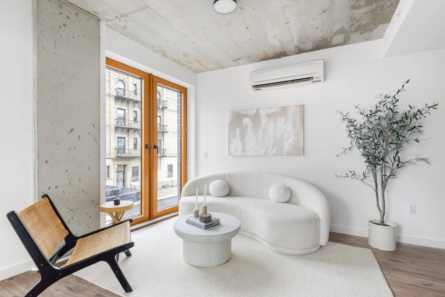 Perched at the top of the building, Residence PH1 is a bright three bedroom, two bathroom home with three exposures and open Manhattan skyline views.