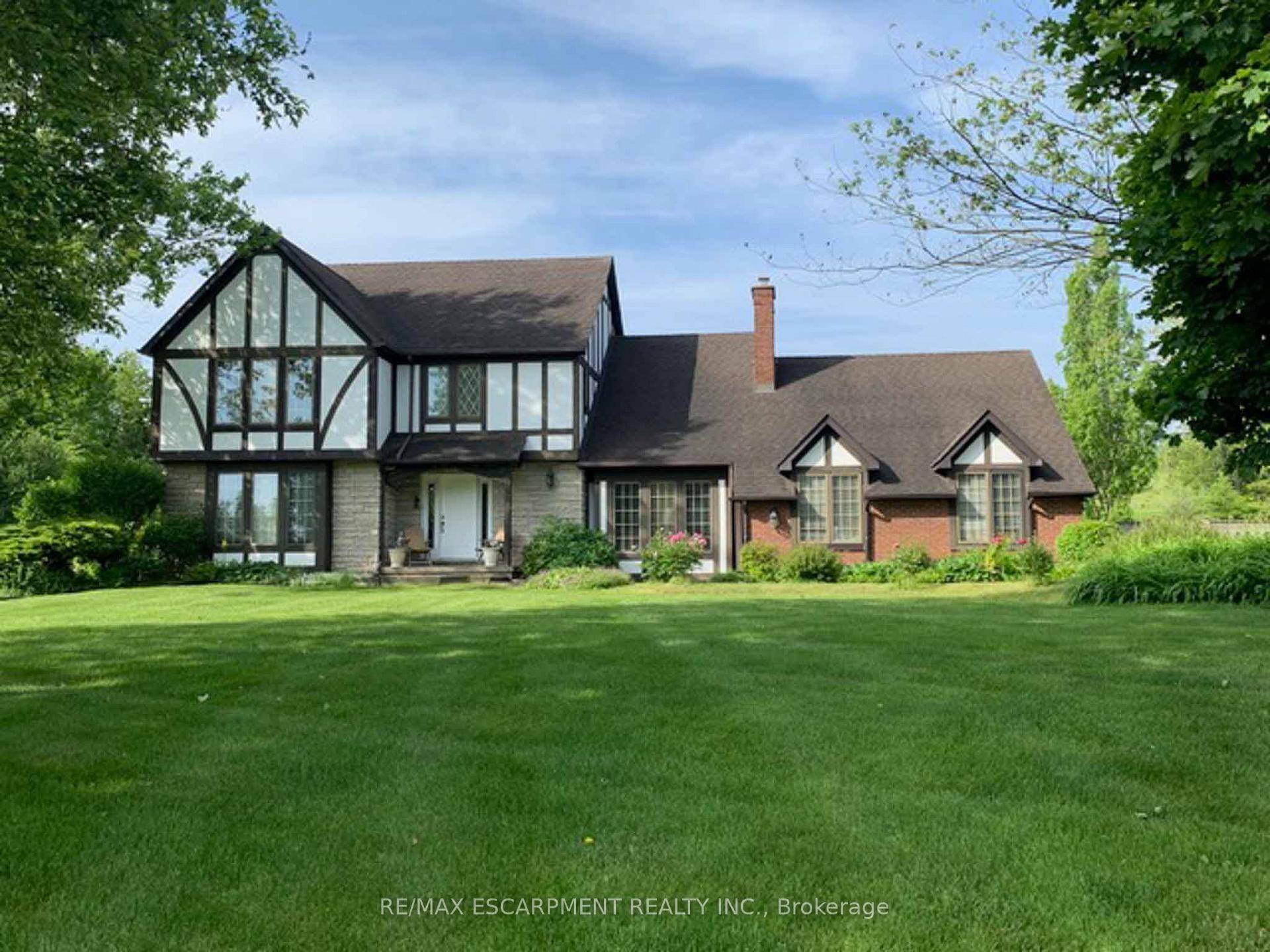 SPECTACULAR HOME ON 2. 14 ACRE LOT, this executive home offers a lifestyle of space, comfort to create timeless family memories.