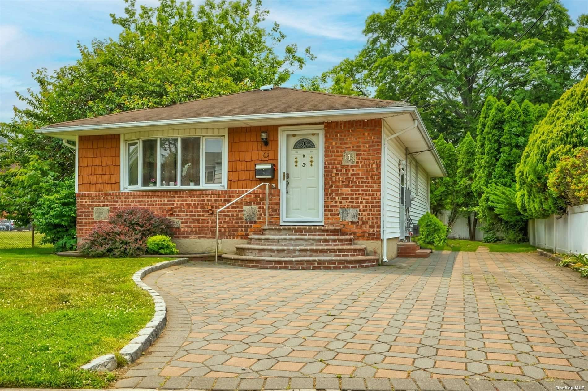 PRICE IMPROVEMENT ! Welcome to this charming three bedroom, two bath character filled brick home with a finished basement with a separate entrance.