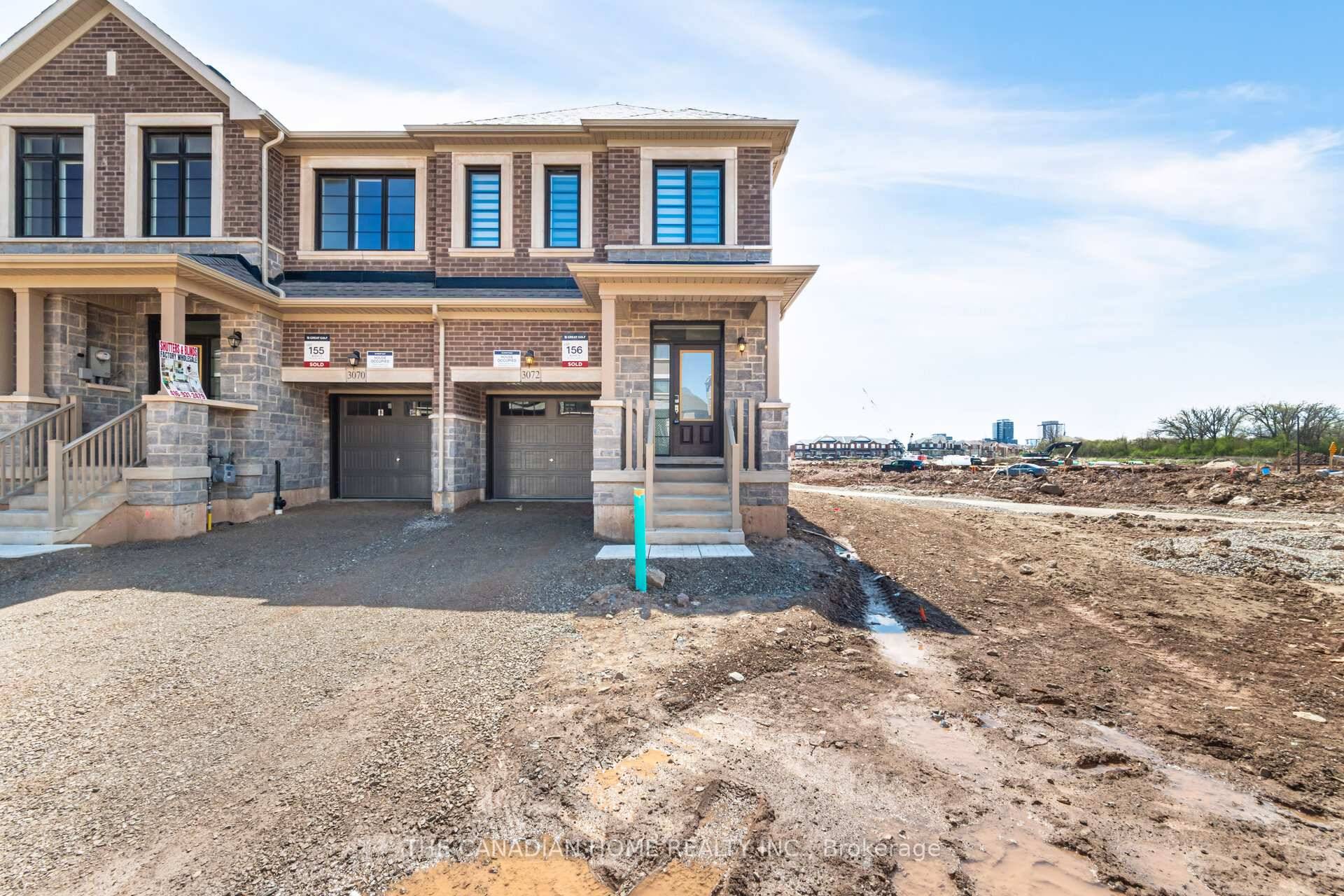 Stunning brand new, never lived in corner townhouse in Oakvilles sought after Joshua Creek community !