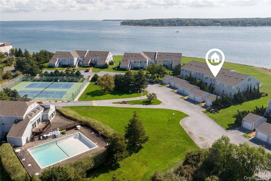 Waterfront ! Experience the luxury of North Fork living in this bright and airy coastal condo.