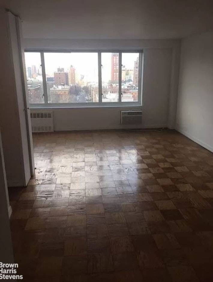 Manhattan a spacious, sunny alcove studio on the 16th floor is ideally situated on Central Park West at W 97th St.