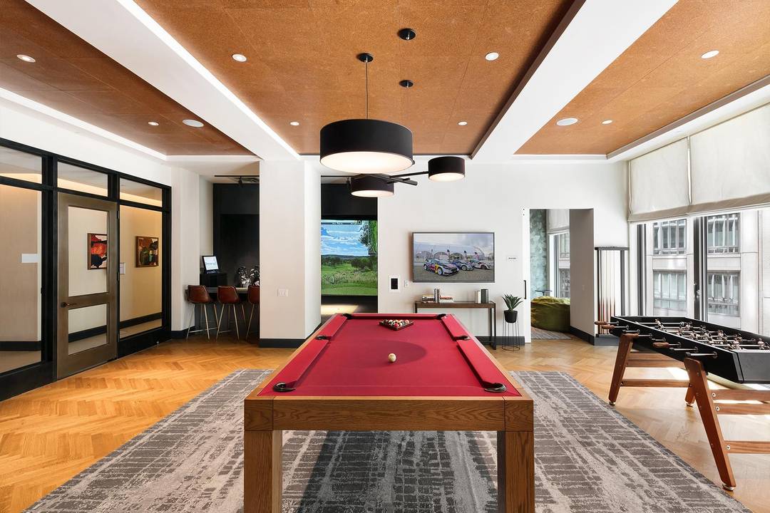 Spacious one bedroom featuring a flexible layout with space for a dedicate dining or home office nook, gourmet kitchen with stainless steel appliances, quartz countertops and eating bar, an in ...