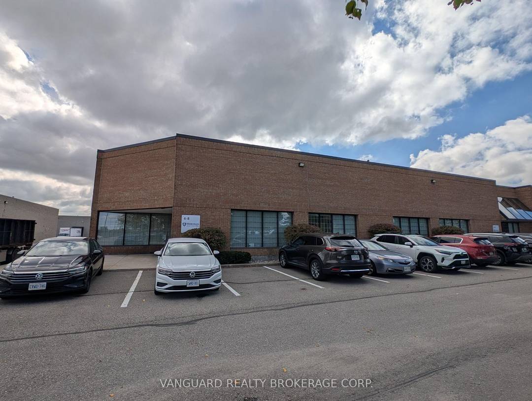 Prime End Unit Featuring A Loading Dock, 18 Ft Ceiling Height, And Close Proximity To The Airport.