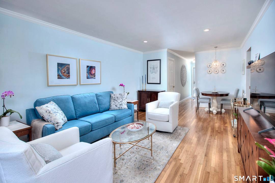 Welcome to this beautifully updated first floor residence in the sought after Mosswood Condominiums.