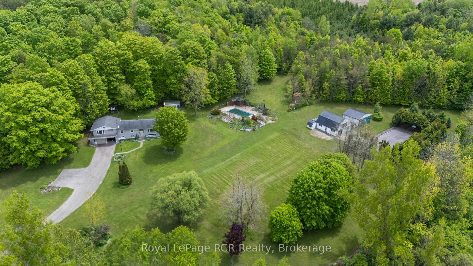 Escape to your secluded private sanctuary a captivating 23 acre estate nestled peacefully back from the road.