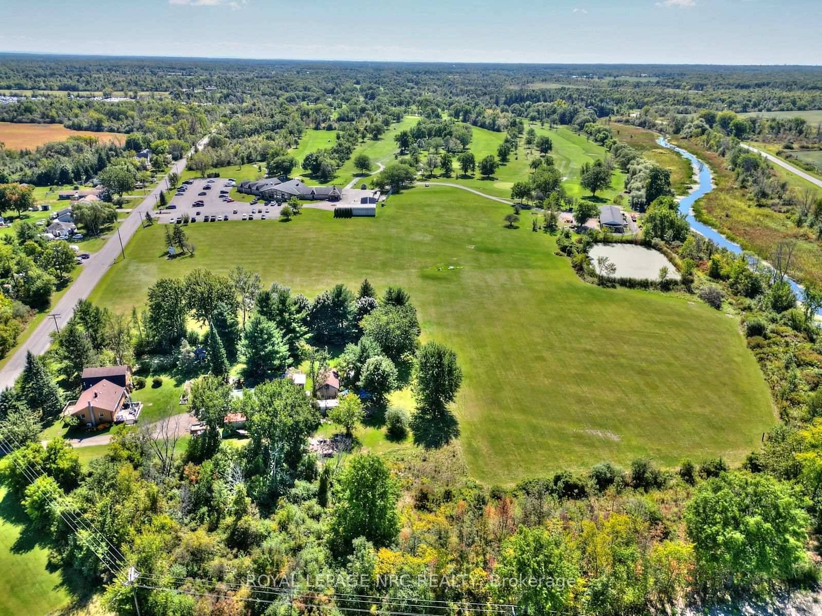 OVER 3 ACRES OF PICTURESQUE WATERFRONT PROPERTY !