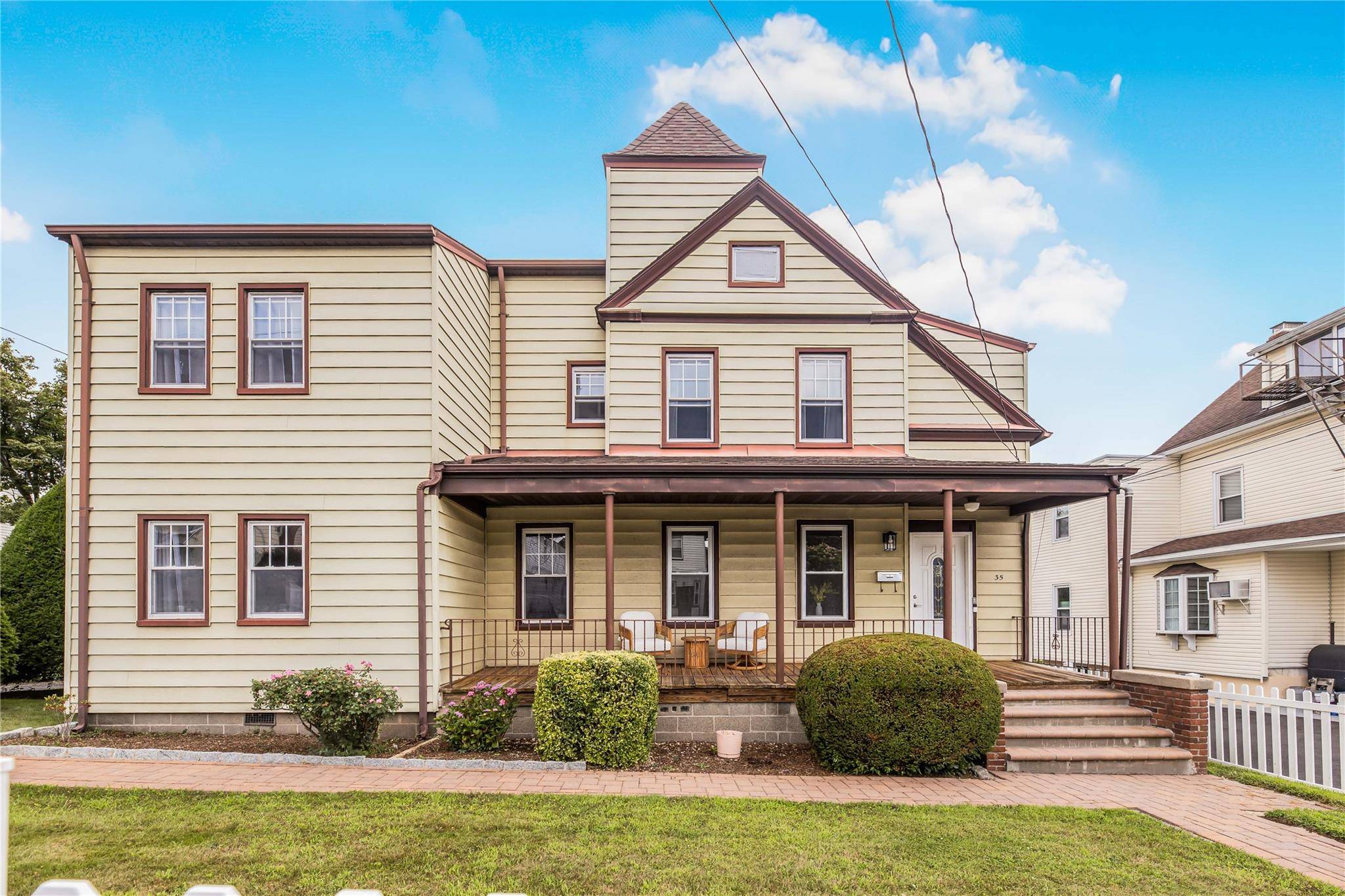 Stunning remodeled 2 Family home on a rare double lot !
