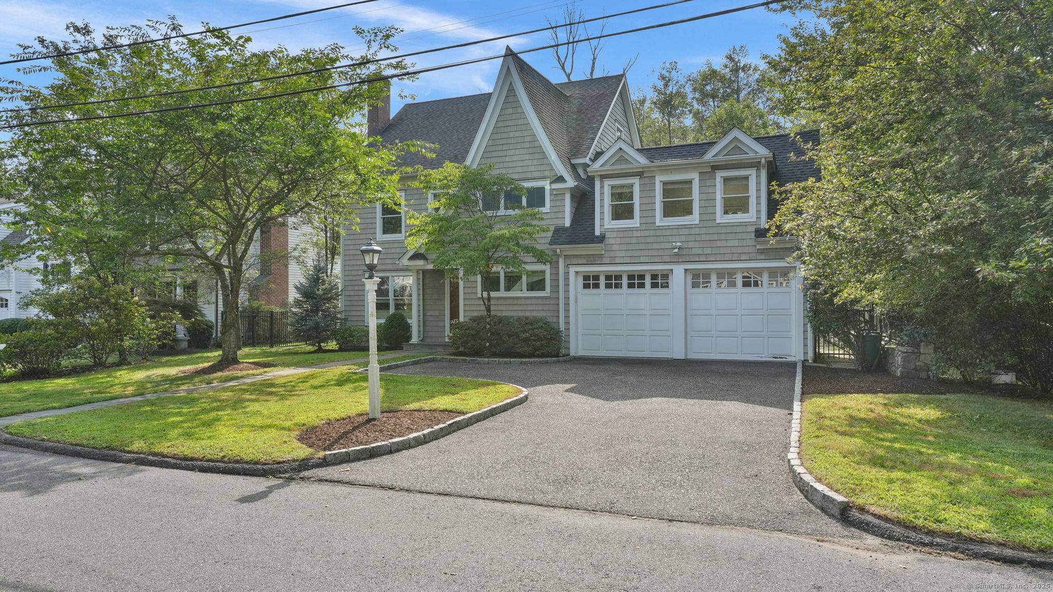 Charming 3 bedroom Darien colonial on quiet cul de sac offers 2, 064 sf of beautifully appointed living space on a lush 0.