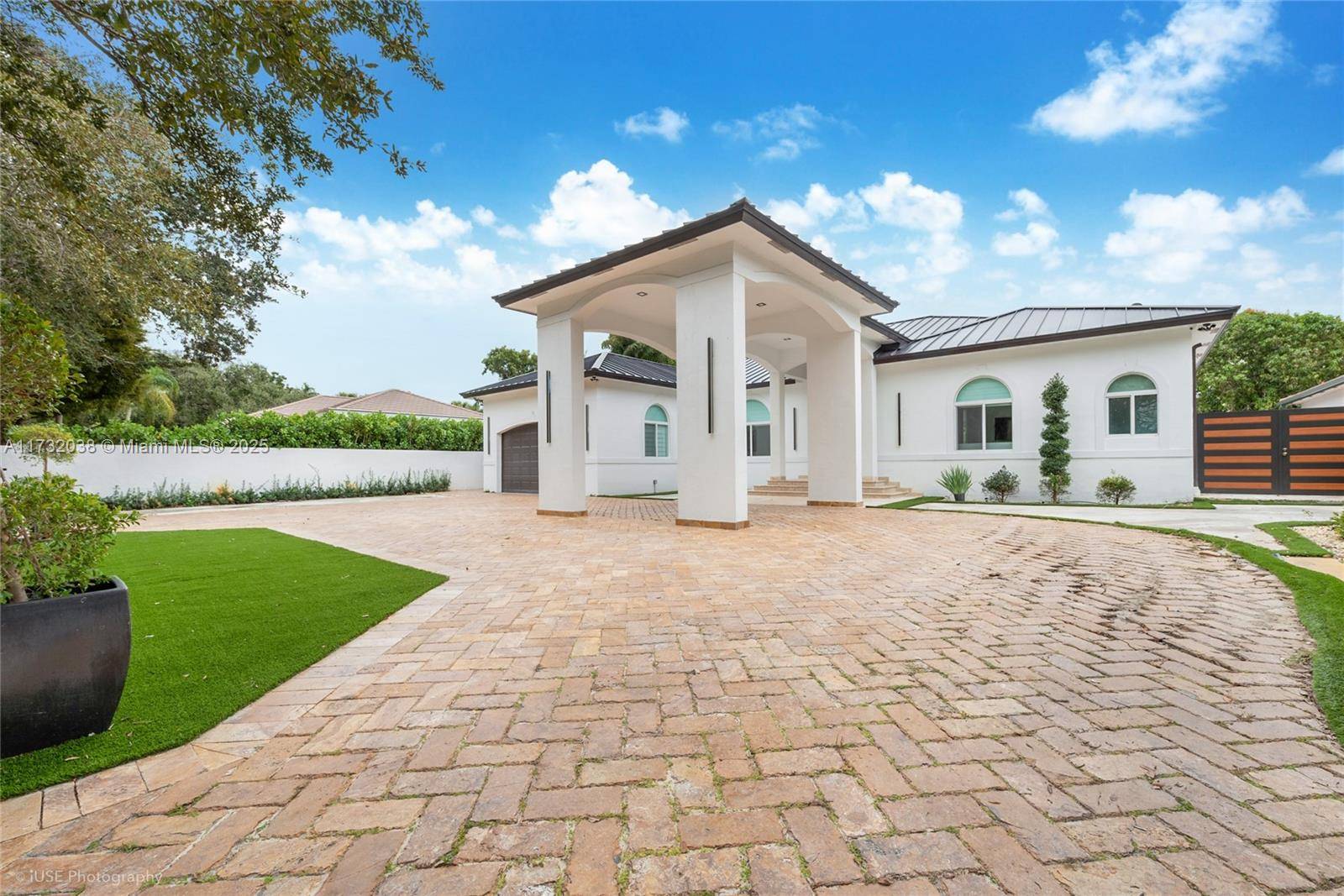 No expense has been spared in this gorgeous gated modern five bedroom, five bath, two car garage luxury home.