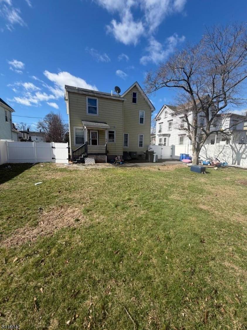 Well maintained 5 bedroom, 3 bath home in North Plainfield with hardwood floors throughout and a finished attic for added flexible living space.