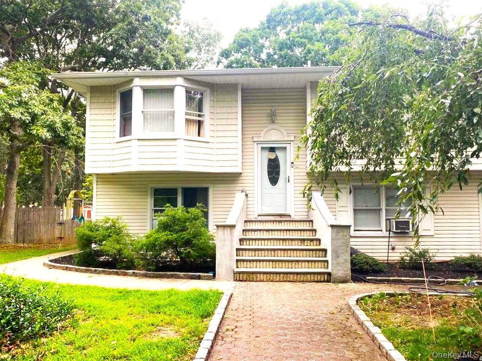Unlock strong cash flow potential with this spacious 5 bed, 2 bath hi ranch property on a generous 0.