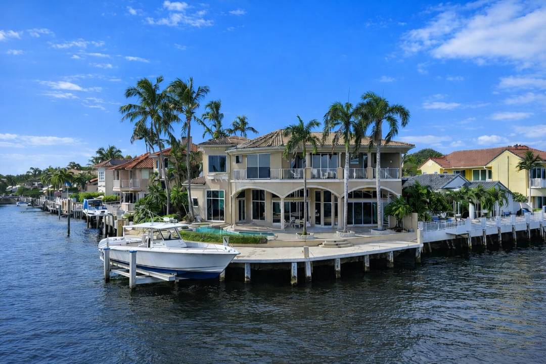 Welcome to prestigious Villa Bellavista and experience unparalleled luxury and privacy in this rare Intracoastal point lot estate, ideally situated within one of Delray Beach's most exclusive gated enclaves.
