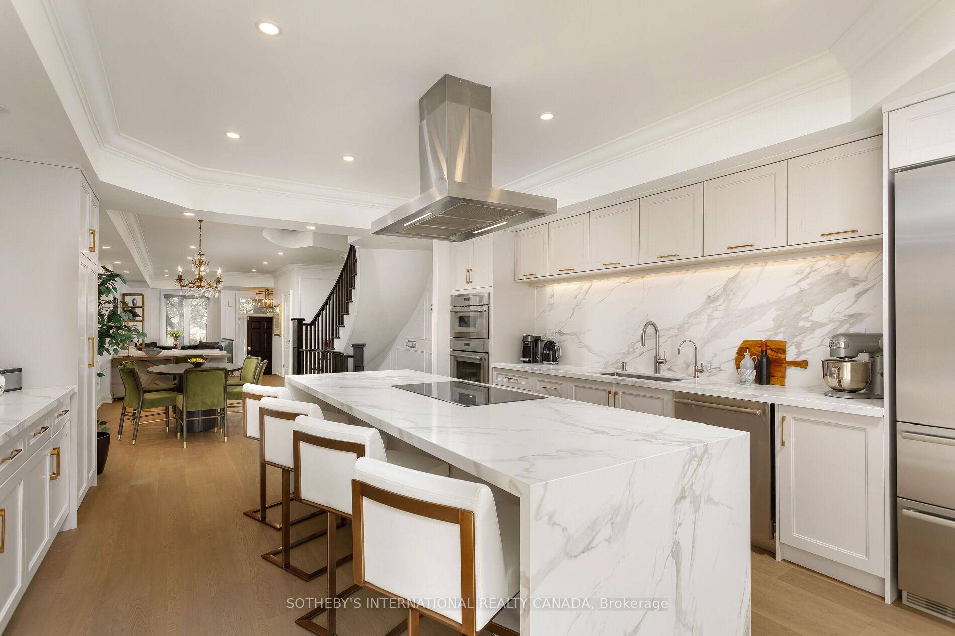 Newly rebuilt 2025, approx 3438 finished interior iconic townhome with spectacular kitchen, rare two storey primary bedroom and 2 car garage at foot of Casa Loma.