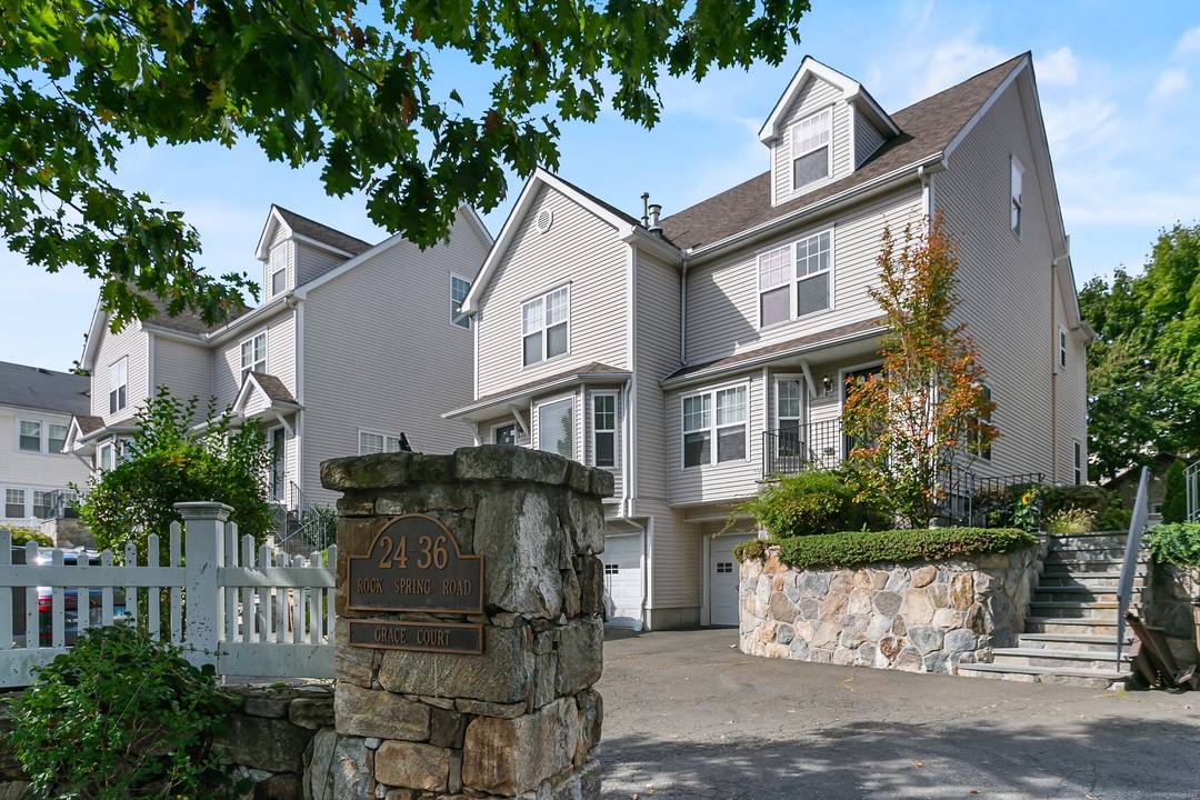 Exceptionally Elegant Townhome with Ultra Stylish Loft and Finished Lower Level !