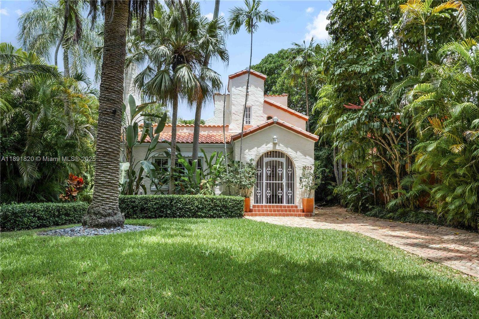 Discover the beauty of this rare 1923 Old Spanish gem on prestigious Asturia Avenue, just one block from the Granada Golf Course.