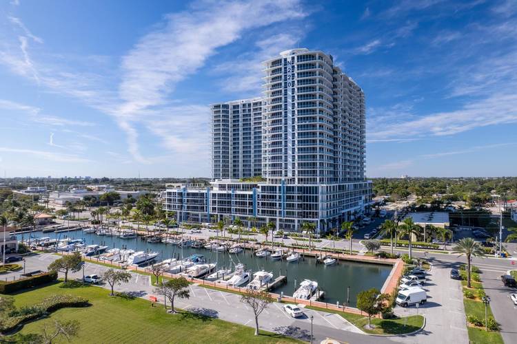This never lived in, waterfront condo offers bright, easy living with stunning Intracoastal views.