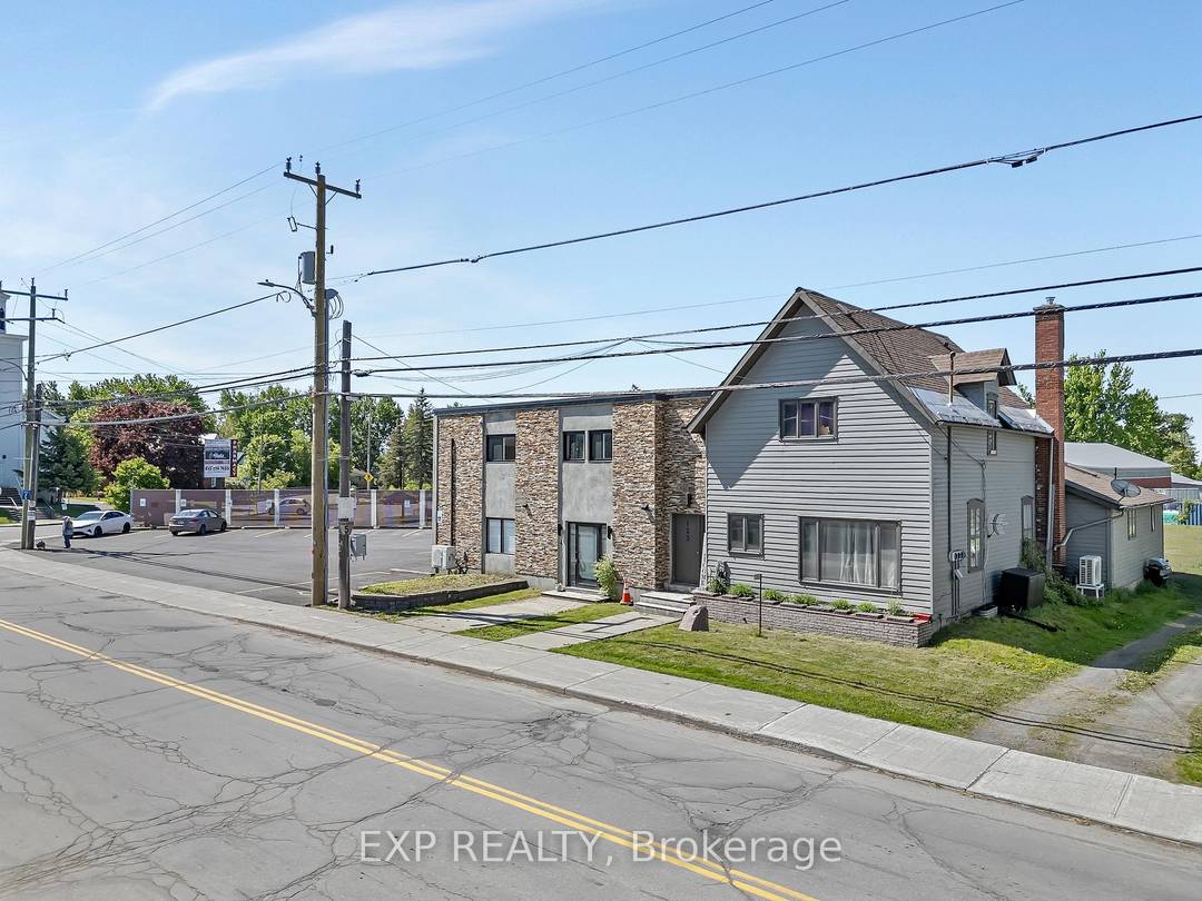 This is a rare investment opportunity featuring eight spacious and beautifully updated residential rental units, including a large single family home attached to the main building.