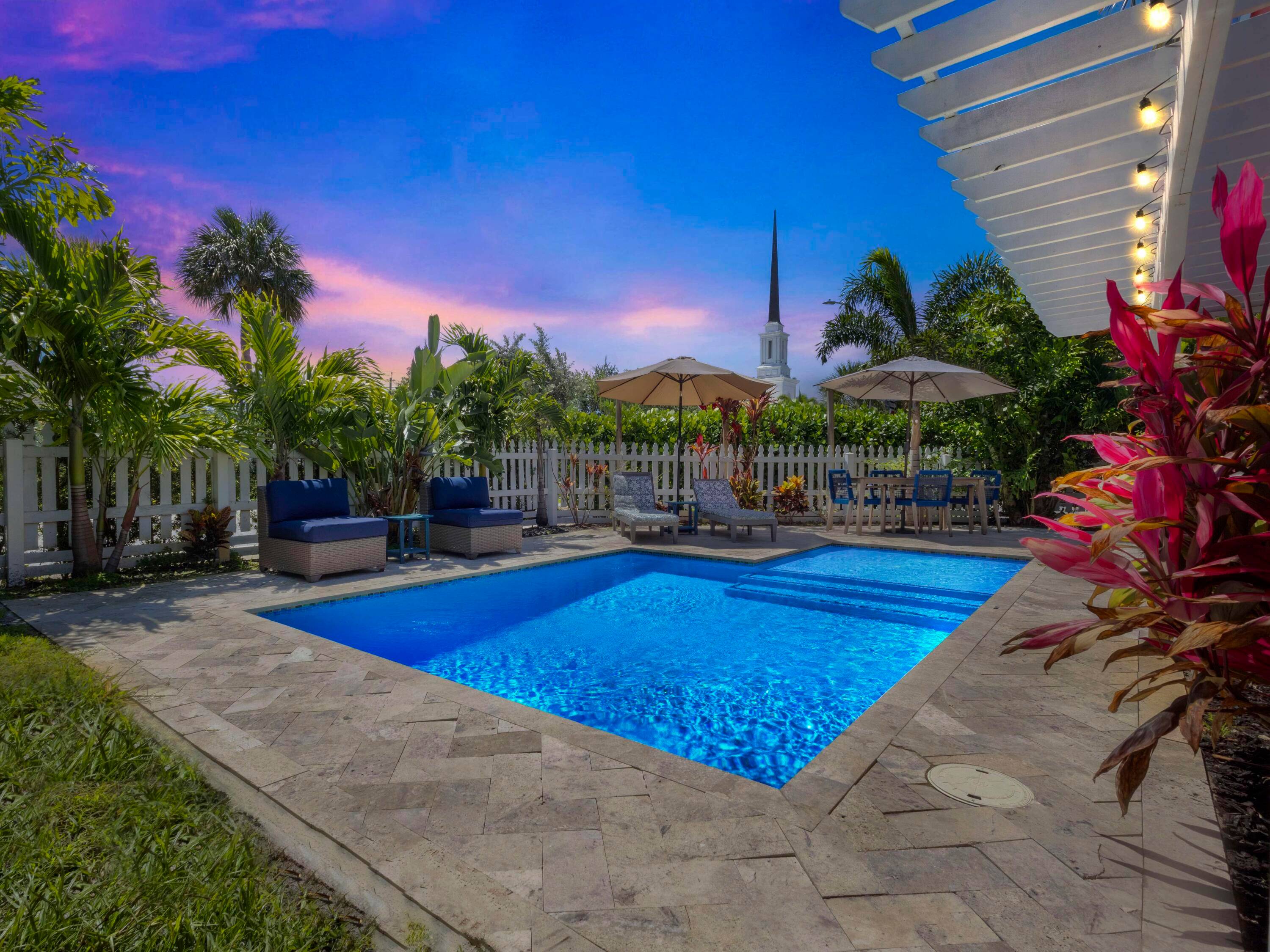 Charming Mid Century home with a NEW private POOL on a corner lot in sought after Parrot Cove Neighborhood !