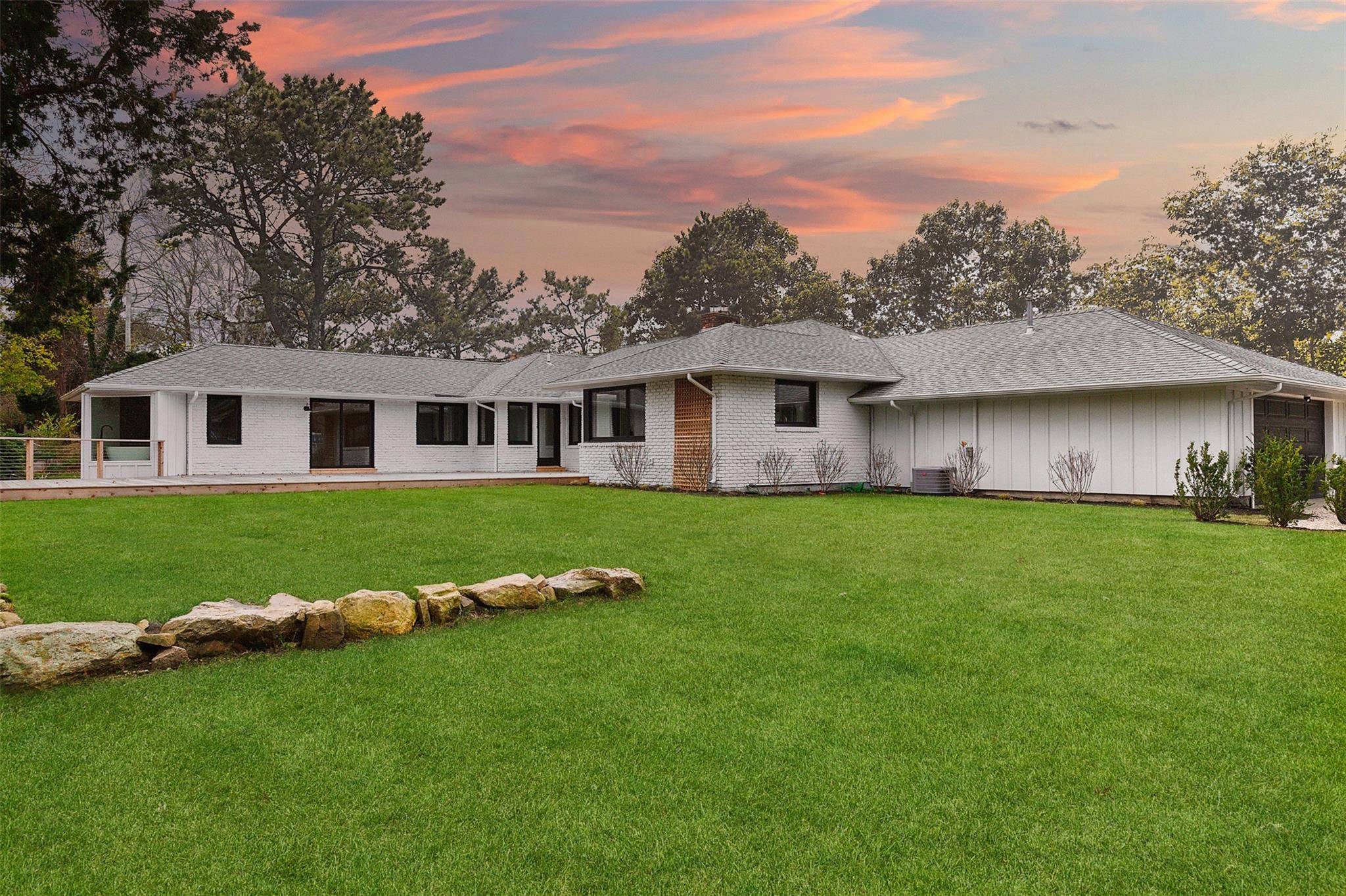 Welcome to 10 Lenape Road, a beautifully renovated gem nestled in the heart of Southampton, NY.