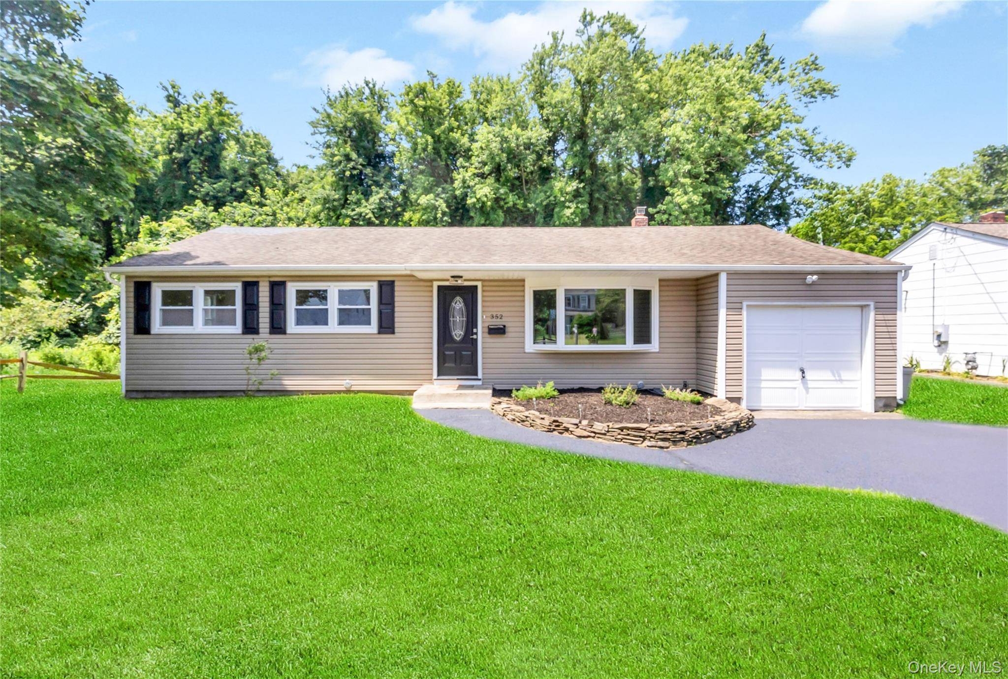 Welcome to this beautifully renovated 3 bedroom, 2 bath ranch located in the heart of Patchogue Village, just blocks from the Great South Bay.