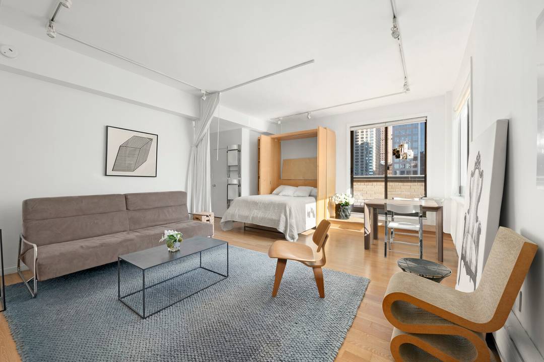 High above Columbus Circle, this penthouse studio with twenty four hour doorman and private terrace feels like the beginning of a great New York story.