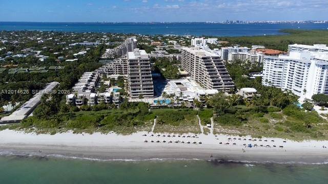 Beautiful and spacious 2 bedroom, 2 bath residence featuring an open concept kitchen, elegant marble flooring, and a bright layout with beautiful beach and tropical views from the large balcony.