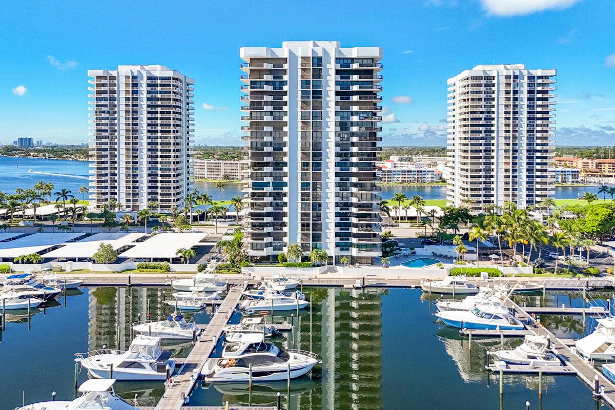 Experience serene waterfront living in this 2 bedroom, 2 bath residence with breathtaking views of the marina and Intracoastal.