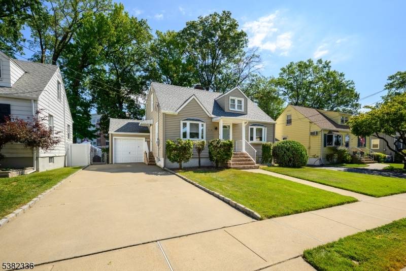 Welcome to 929 Woodland Avenue in Union Township, a spacious and well maintained 3 bedroom, 2 bath expanded Cape Cod with excellent curb appeal !