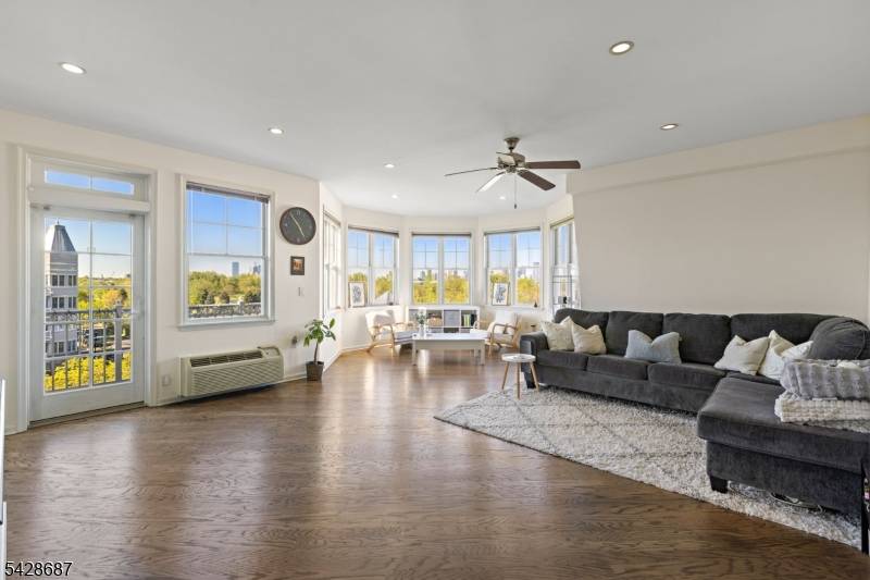 Residence 404 at 15 Freedom Way is a 1510 SF 2 bedroom 2 bathroom top floor condo with directly NYC views.