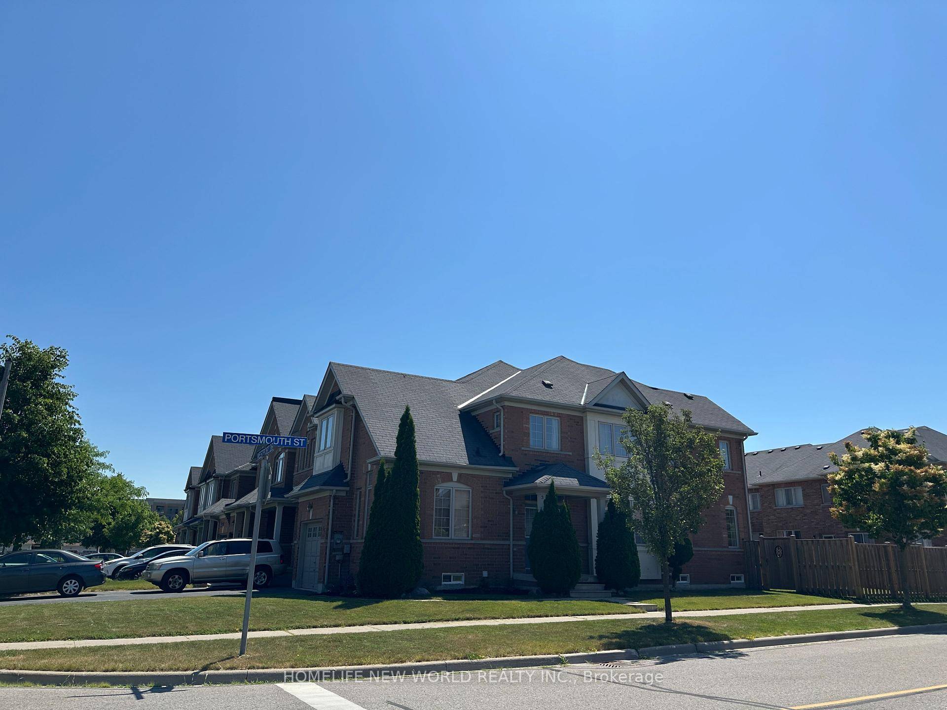 Beautifully updated and sun filled corner unit offering rare 4 bedroom layout on a large lot !