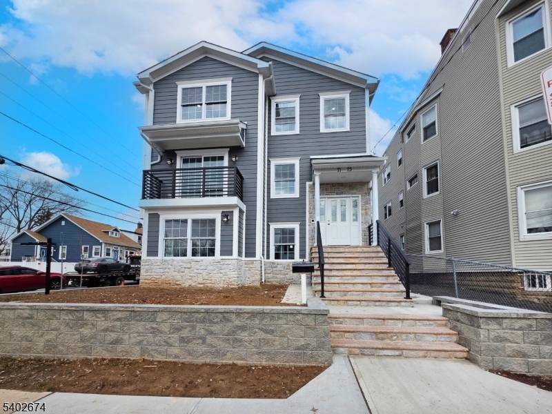 Welcome to this brand new construction two family home offering an exceptional layout with over 4, 300 sq ft of quality living space.