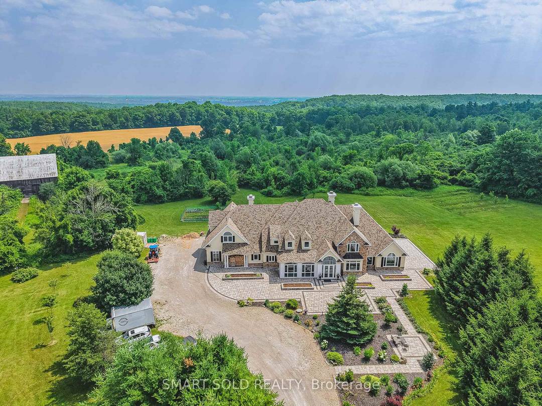 Set on over 96 acres of rolling countryside, this exceptional estate offers a rare blend of refined living and natural beauty.