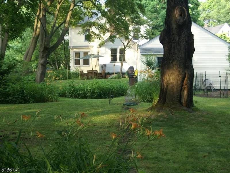 Enjoy a spacious home with a classic layout featuring formal dining, eat in kitchen, multiple living areas, partially finished basement, and finished attic.