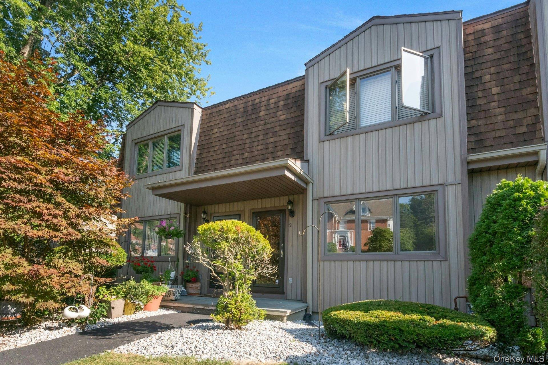This spacious and sun filled 3 lev3l townhouse lives like a single family home, offering three beautifully finished levels including a walk out basement and serene, private wooded views, all ...