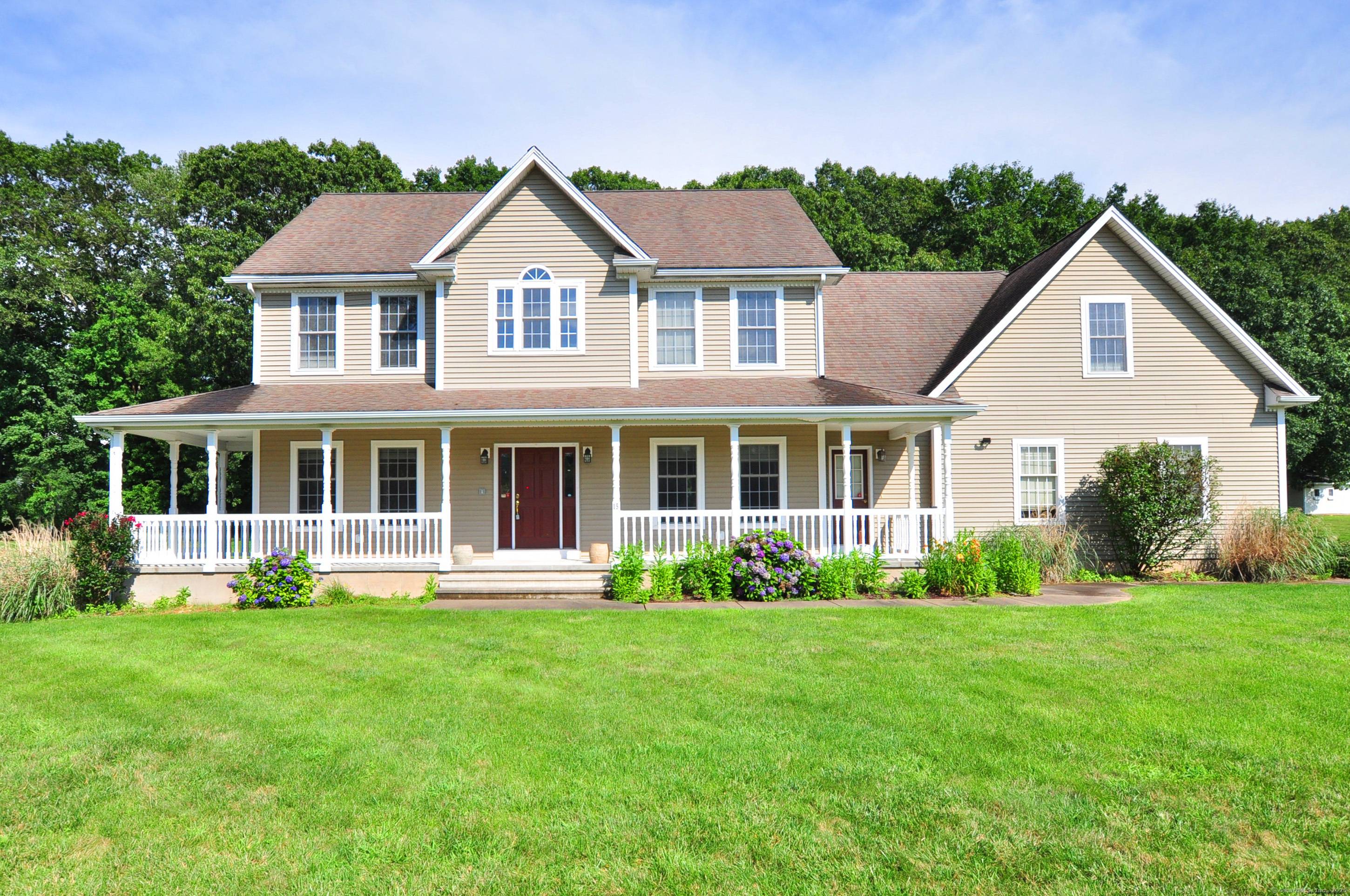 Tucked away on a quiet cul de sac, this spacious colonial has everything you're looking for.