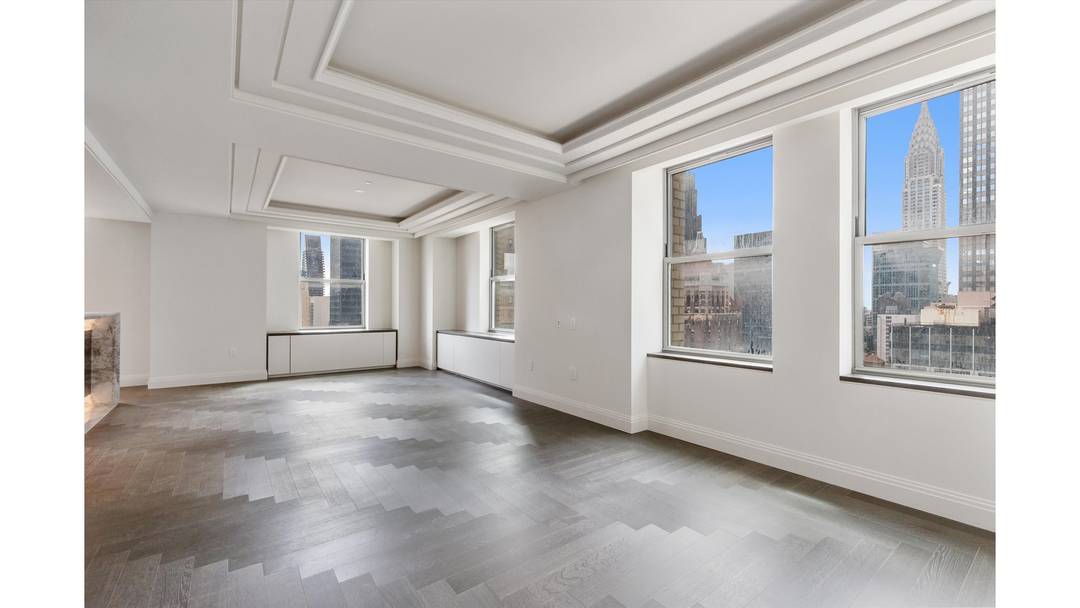 WELCOME TO THIS EXCLUSIVE TWO BEDROOM, TWO AND HALF BATH HOME AT THE ICONIC WALDORF ASTORIA RESIDENCES WITH STUNNING VIEWS OF THE CHRYSLER BUILDING.